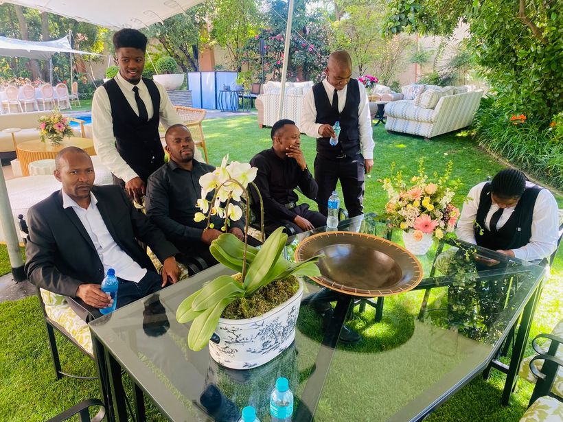 TM Events team seated around an event table