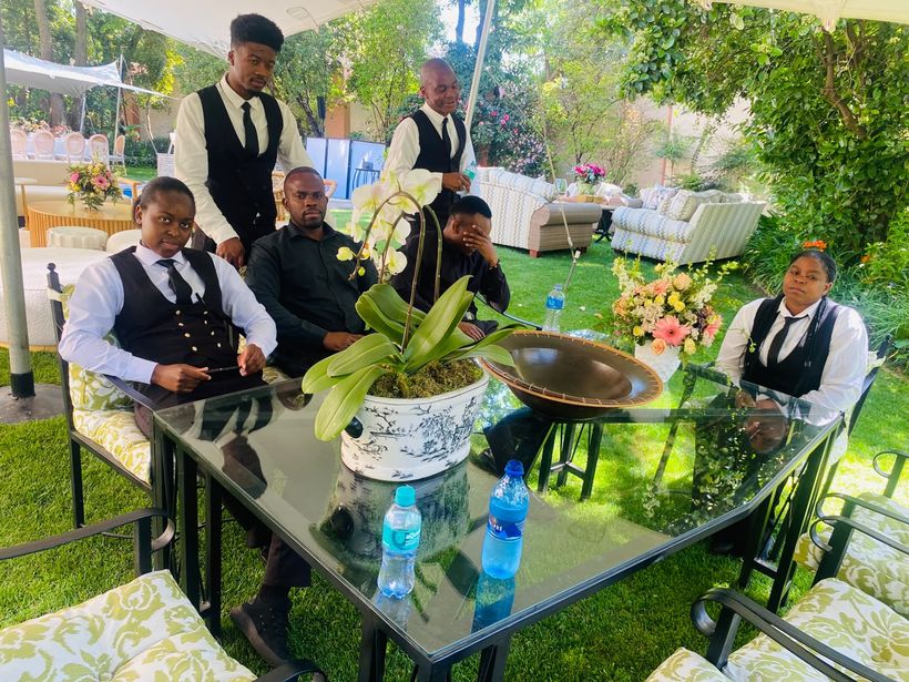 TM Events team at a set garden banquet table
