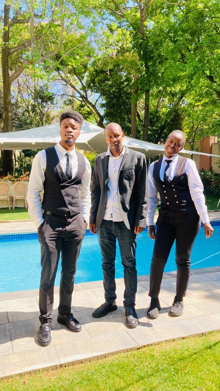 TM Events ushers welcoming guests at a function