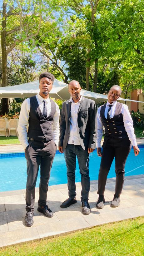 Three TM Events staff members poolside