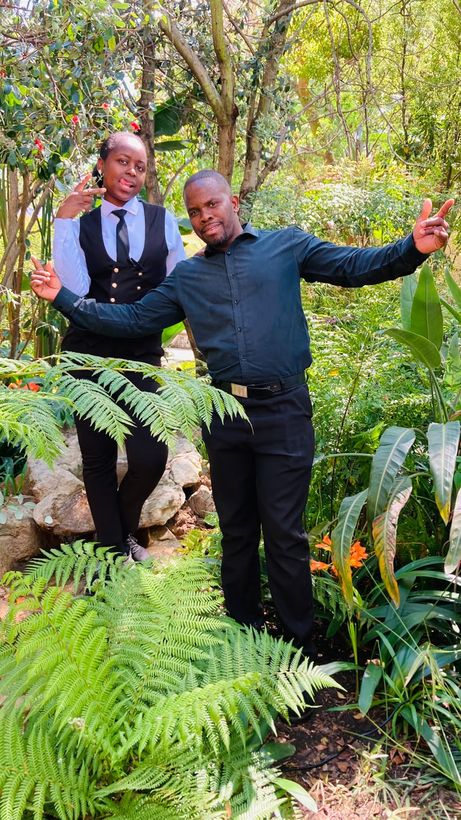 TM Events staff welcoming guests in the garden