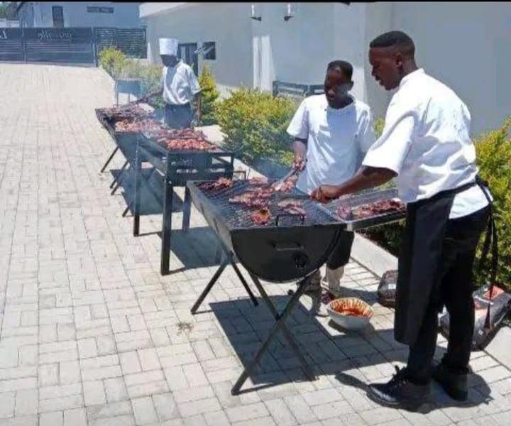 TM Events braai chefs grilling at a function