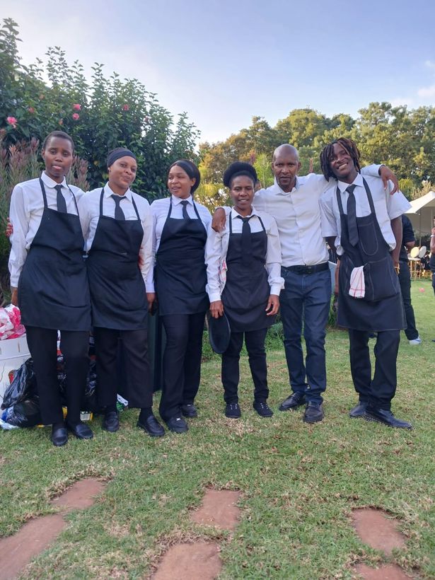 The full TM Events Waitering team in uniform at a function